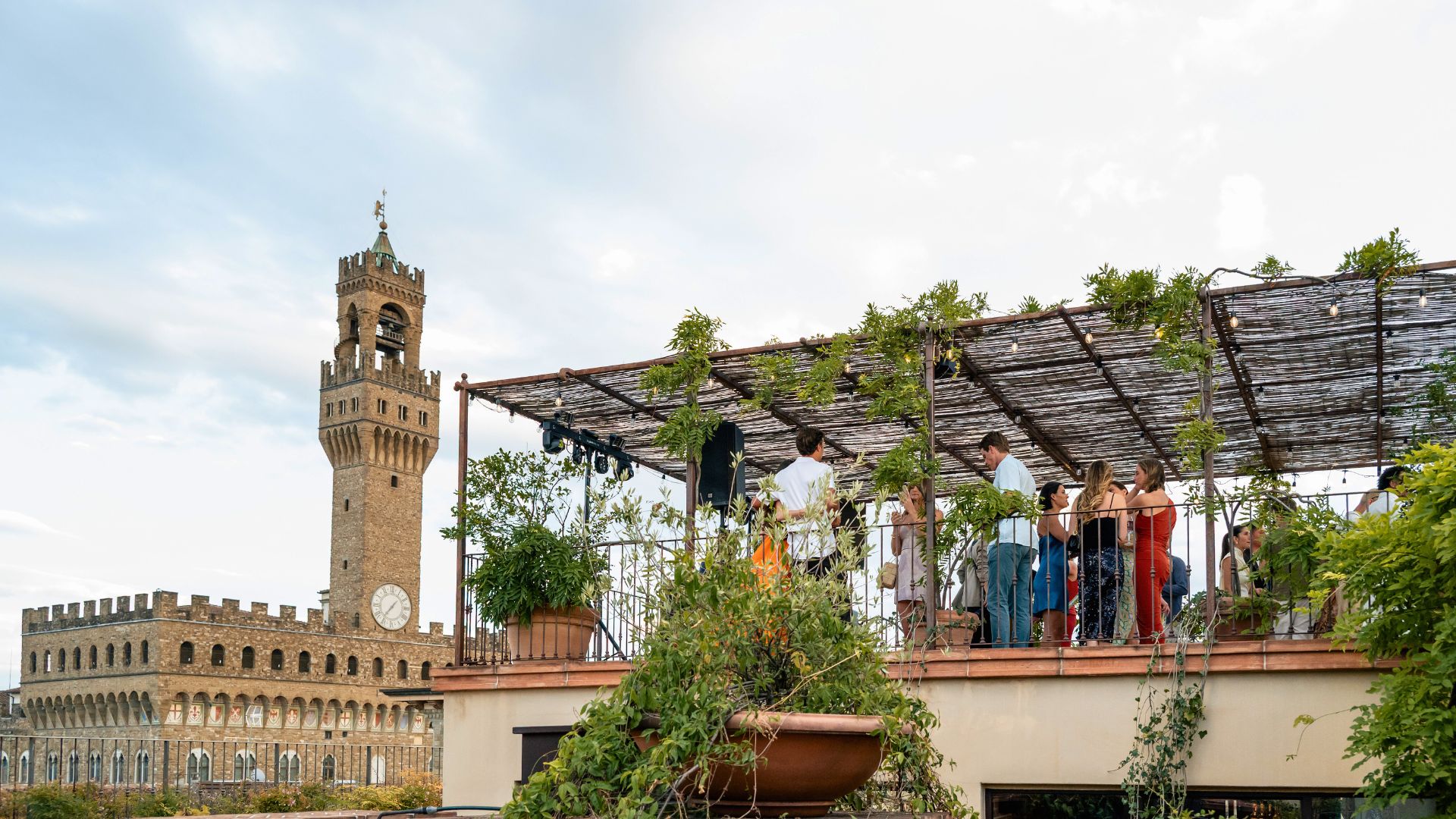 Rooftop terrace in daylight with Florence skyline, ideal for corporate events
